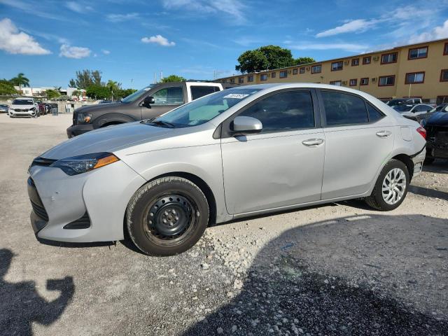 TOYOTA COROLLA L 2019 with VIN 5YFBURHE6KP947294 - Photo from auction