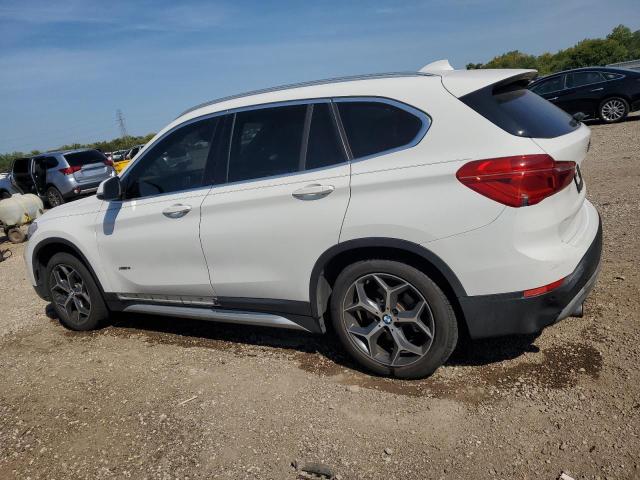 Photo 2 from auction – 2016 BMW X1 XDRIVE2 with VIN WBXHT3C32GP888367