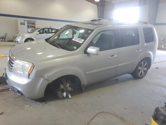 HONDA PILOT TOURING 2015 with VIN 5FNYF4H98FB055169 - Photo from auction