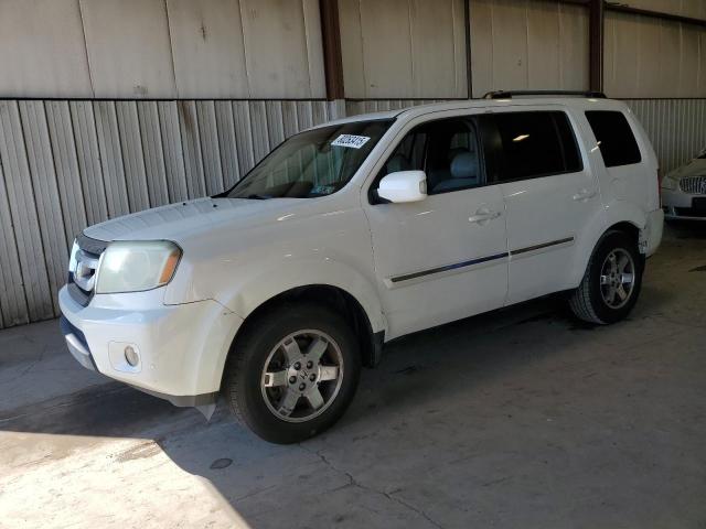 HONDA PILOT TOUR 2011 with VIN 5FNYF4H99BB042537 - Photo from auction