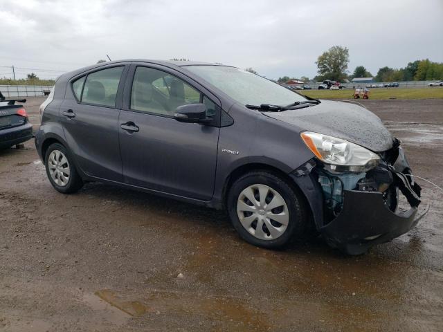 Photo 4 from auction – 2014 TOYOTA PRIUS C with VIN JTDKDTB33E1573871