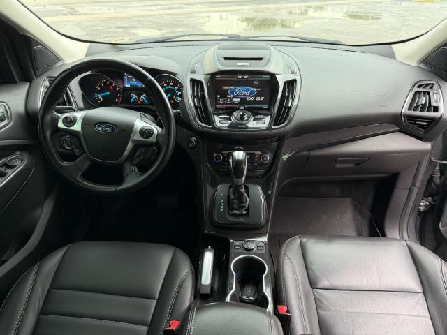 Photo 9 from auction – 2014 FORD ESCAPE TIT with VIN 1FMCU0JX4EUC57204
