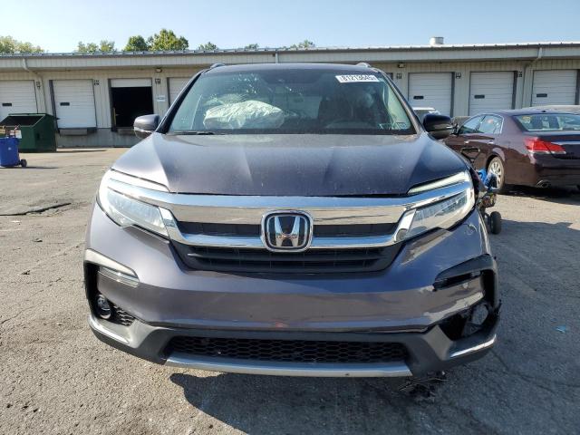 Photo 5 from auction – 2021 HONDA PILOT TOURING with VIN 5FNYF6H91MB016397