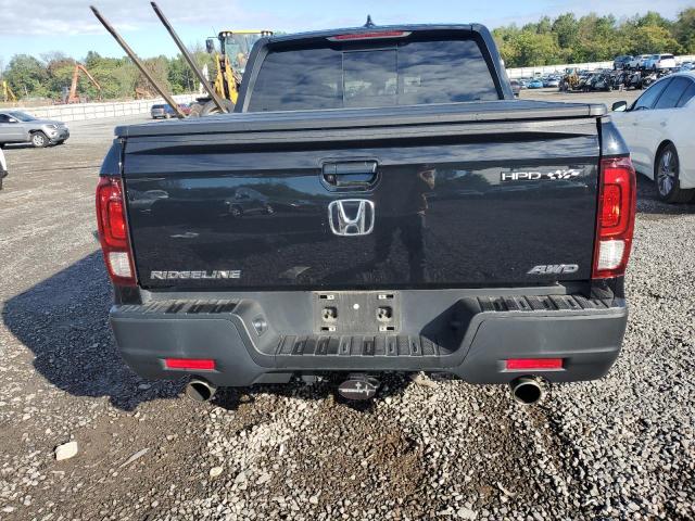 Photo 6 from auction – 2022 HONDA RIDGELINE with VIN 5FPYK3F50NB001036