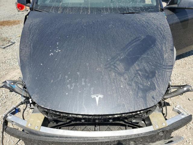 Photo 11 from auction – 2024 TESLA MODEL Y with VIN 7SAYGDEE8RF063701