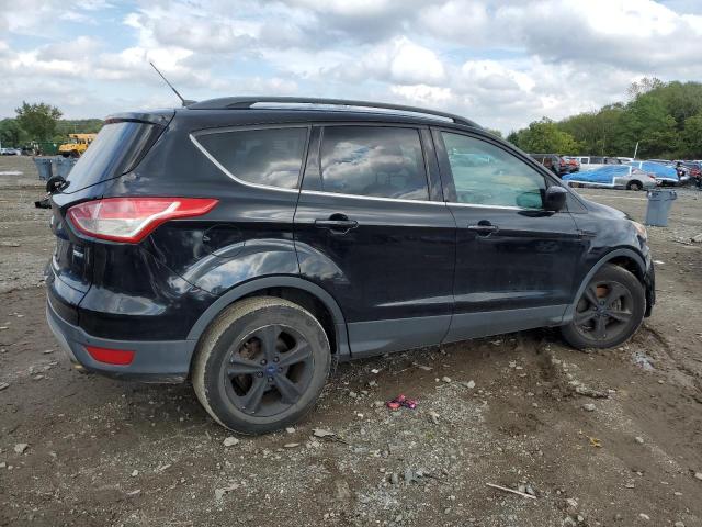 Photo 3 from auction – 2016 FORD ESCAPE SE with VIN 1FMCU9GX4GUA55395