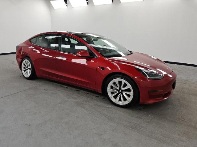 Photo 4 from auction – 2022 TESLA MODEL 3 with VIN 5YJ3E1EAXNF303835
