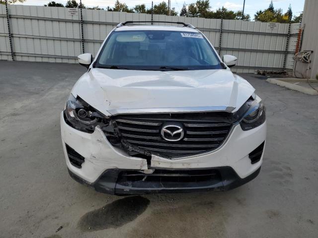 Photo 5 from auction – 2016 MAZDA CX-5 GT with VIN JM3KE2DY0G0854171