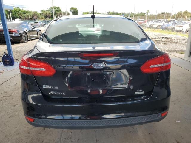 Foto 6 de la subasta – 2018 FORD FOCUS SE con VIN 1FADP3FEXJL247131