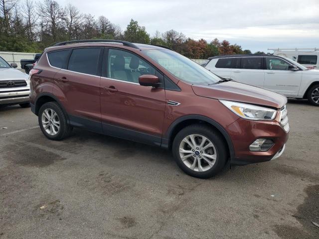 Photo 4 from auction – 2018 FORD ESCAPE SE with VIN 1FMCU9GD1JUB19387