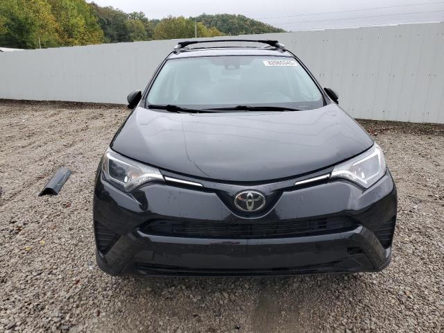 Photo 5 from auction – 2018 TOYOTA RAV4 LE with VIN 2T3BFREV7JW827944