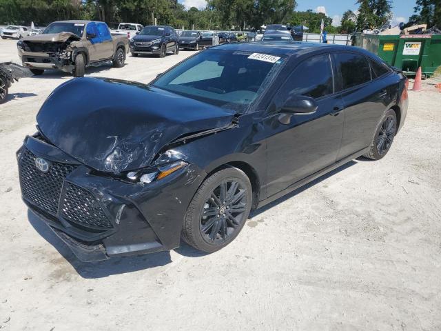 TOYOTA AVALON NIG 2022 with VIN 4T1EA1AB1NU014803 - Photo from auction
