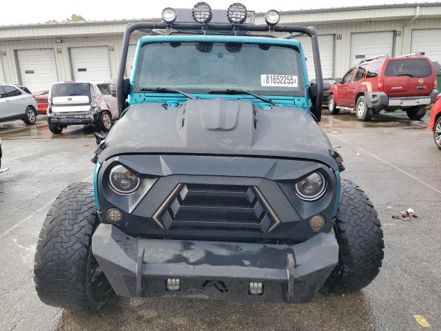 Photo 5 from auction – 2016 JEEP WRANGLER U with VIN 1C4BJWDG7GL114005