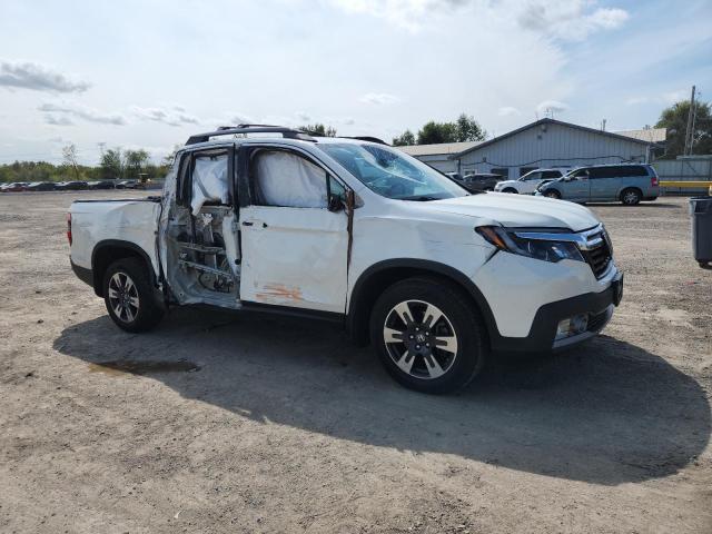 Photo 4 from auction – 2019 HONDA RIDGELINE with VIN 5FPYK3F72KB004503