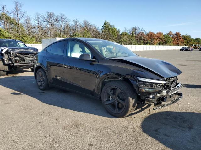 Photo 4 from auction – 2026 TESLA MODEL Y with VIN 7SAYGDEE0TA411902