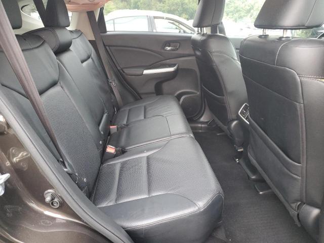 Photo 11 from auction – 2016 HONDA CR-V EXL with VIN 2HKRM4H75GH677286