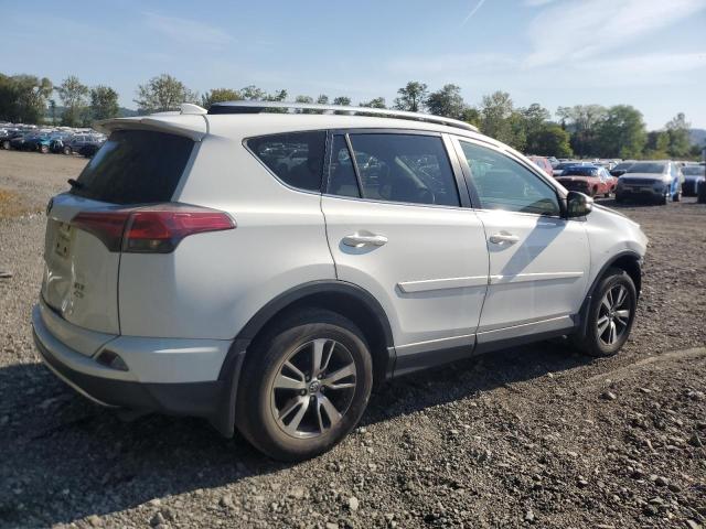 Photo 3 from auction – 2016 TOYOTA RAV4 XLE with VIN JTMRFREV8GJ057629