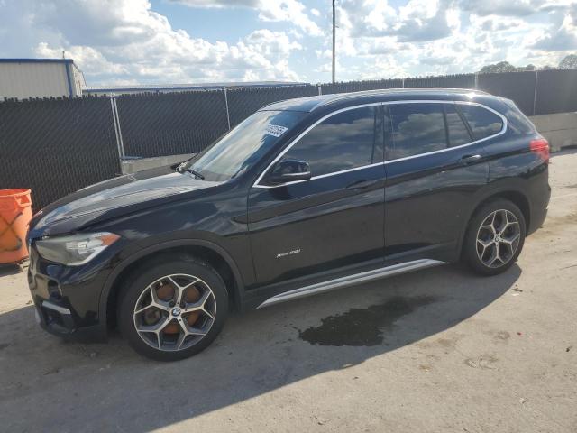 BMW X1 XDRIVE2 2016 with VIN WBXHT3C34GP886684 - Photo from auction