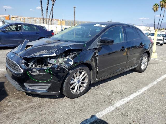 FORD FOCUS SE 2018 with VIN 1FADP3F22JL315069 - Photo from auction