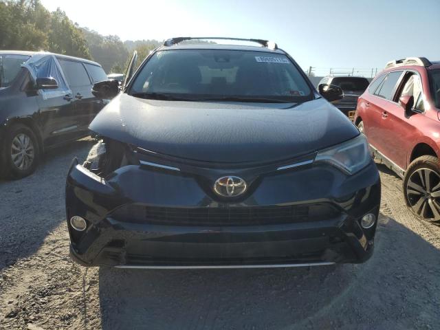 Photo 5 from auction – 2017 TOYOTA RAV4 XLE with VIN 2T3RFREV0HW680861