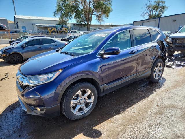 HONDA CR-V EX 2018 with VIN 7FARW2H52JE017259 - Photo from auction