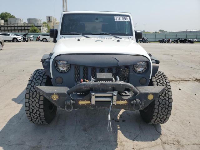 Photo 5 from auction – 2017 JEEP WRANGLER U with VIN 1C4BJWDG3HL657109