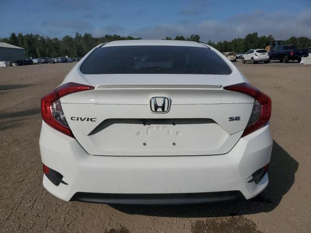 Photo 6 from auction – 2018 HONDA CIVIC LX with VIN 2HGFC2F67JH043371