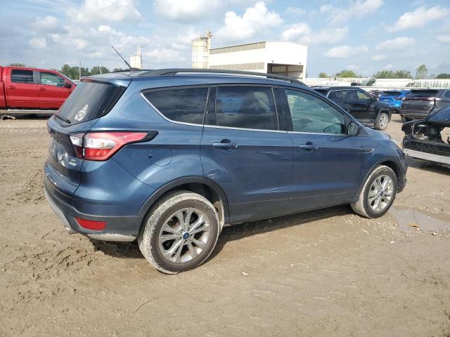 Photo 3 from auction – 2018 FORD ESCAPE SE with VIN 1FMCU0GD4JUB70961