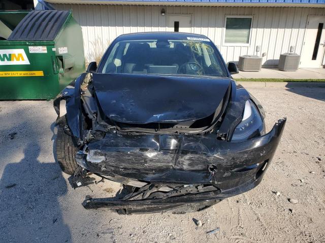 Photo 5 from auction – 2023 TESLA MODEL 3 with VIN 5YJ3E1EC6PF394218