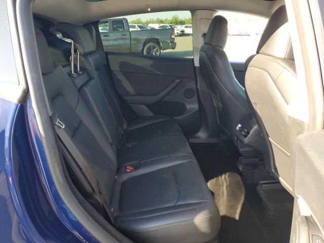 Photo 11 from auction – 2023 TESLA MODEL Y with VIN 7SAYGDEE5PF862316