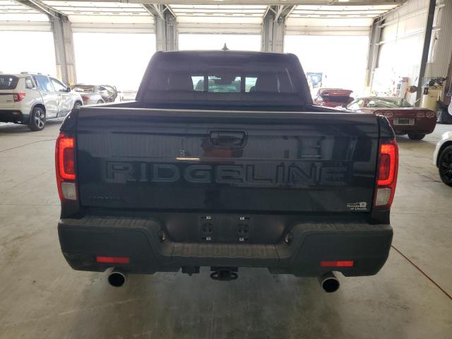 Photo 6 from auction – 2024 HONDA RIDGELINE with VIN 5FPYK3F59RB025860