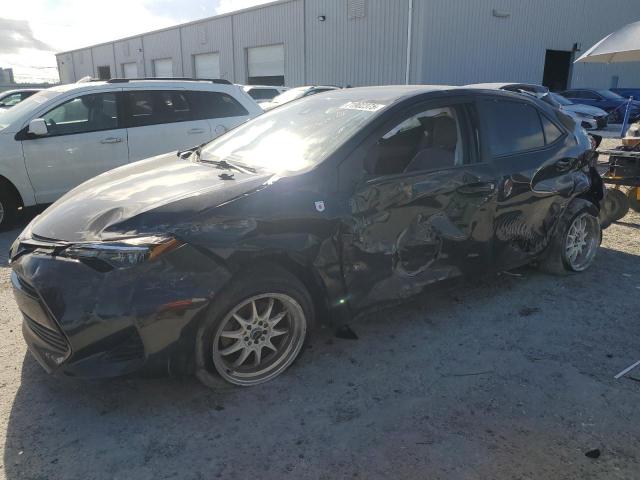 TOYOTA COROLLA L 2018 with VIN 5YFBURHEXJP836519 - Photo from auction