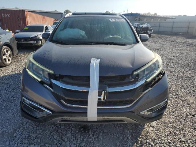 Photo 5 from auction – 2015 HONDA CR-V EXL with VIN 2HKRM4H78FH647312