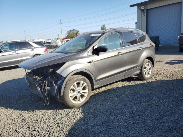 FORD ESCAPE SE 2018 with VIN 1FMCU9GDXJUA92383 - Photo from auction