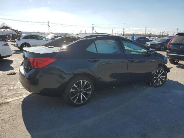 Photo 3 from auction – 2017 TOYOTA COROLLA L with VIN 5YFBURHE6HP648879