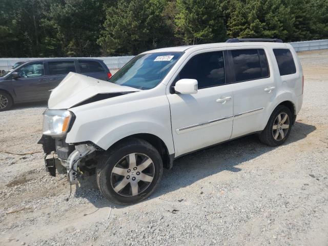 HONDA PILOT TOUR 2014 with VIN 5FNYF3H91EB014679 - Photo from auction