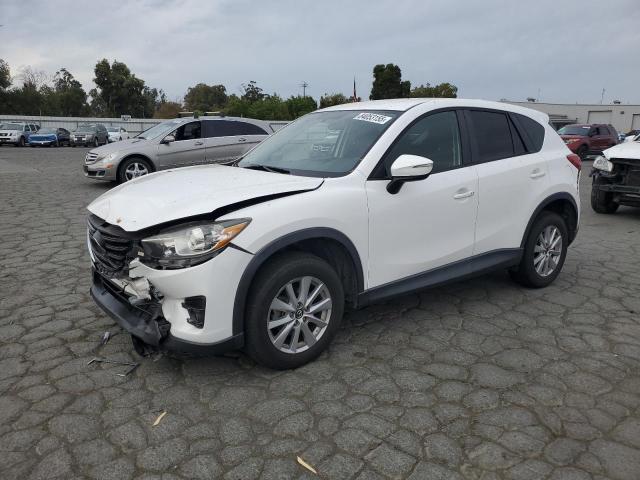 MAZDA CX-5 TOURI 2016 with VIN JM3KE2CY7G0767272 - Photo from auction