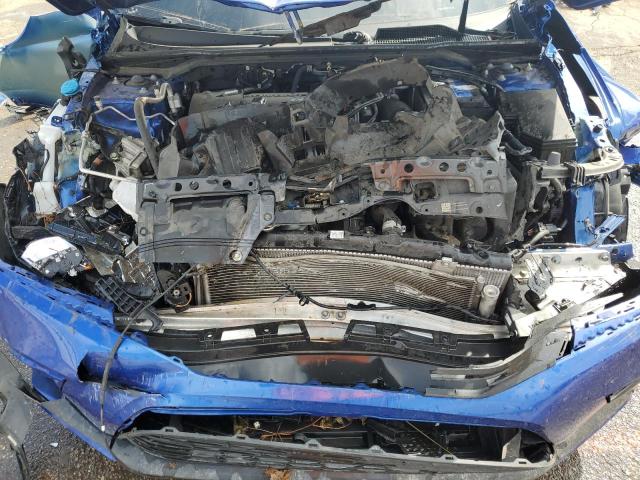 Photo 11 from auction – 2023 HONDA CIVIC SPOR with VIN 2HGFE2F5XPH524533