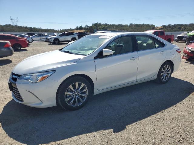 TOYOTA CAMRY LE 2016 with VIN 4T1BF1FK5GU611033 - Photo from auction
