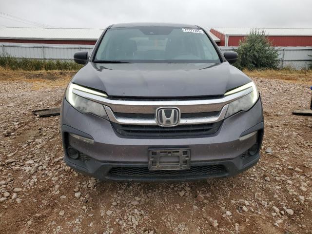 Photo 5 from auction – 2019 HONDA PILOT LX with VIN 5FNYF6H15KB072463