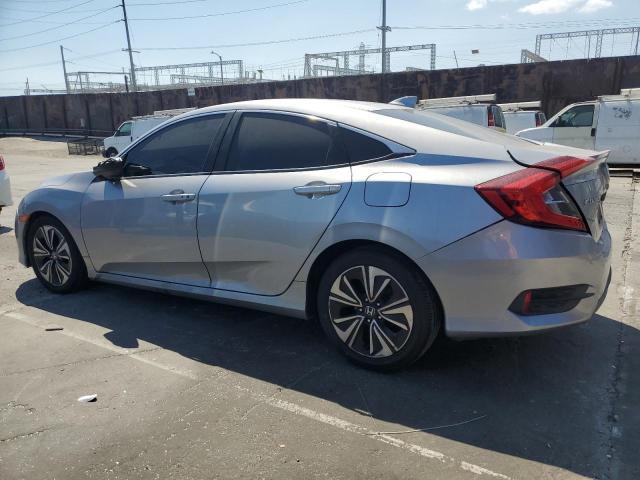 Photo 2 from auction – 2017 HONDA CIVIC EX with VIN 2HGFC1F35HH659113