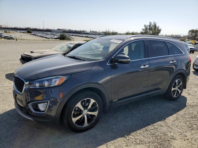 KIA SORENTO EX 2016 with VIN 5XYPHDA13GG020575 - Photo from auction