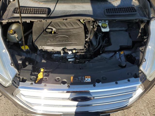 Photo 12 from auction – 2017 FORD ESCAPE SE with VIN 1FMCU9GD6HUC98357