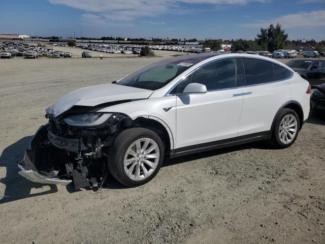 TESLA MODEL X 2021 with VIN 5YJXCBE2XMF319604 - Photo from auction