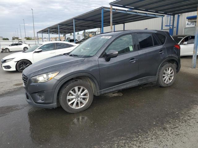 MAZDA CX-5 TOURI 2016 with VIN JM3KE2CY5G0698856 - Photo from auction