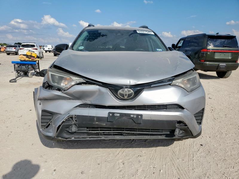 Photo 5 from auction – 2018 TOYOTA RAV4 LE with VIN 2T3ZFREV4JW516583