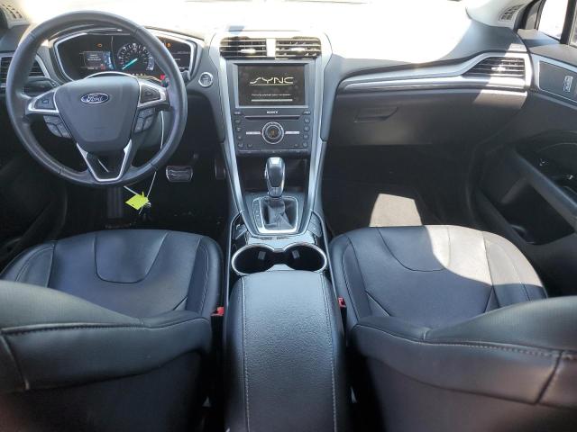 Photo 8 from auction – 2016 FORD FUSION TITANIUM PHEV with VIN 3FA6P0SU9GR316342