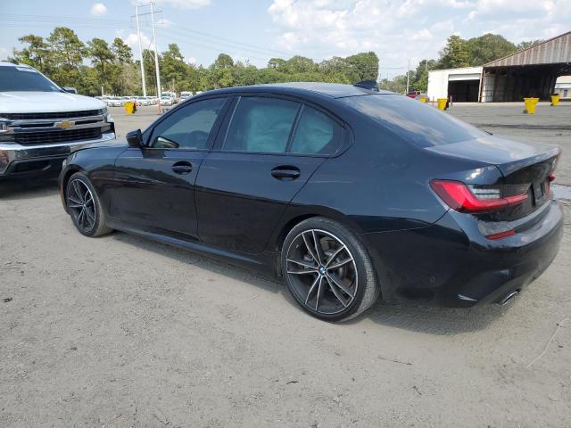 Photo 2 from auction – 2021 BMW 330I with VIN 3MW5R1J01M8B50661