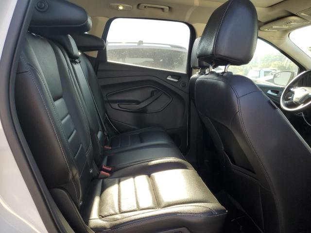 Photo 11 from auction – 2016 FORD ESCAPE TIT with VIN 1FMCU9J90GUA63911