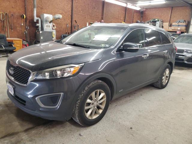 KIA SORENTO LX 2016 with VIN 5XYPGDA33GG056724 - Photo from auction